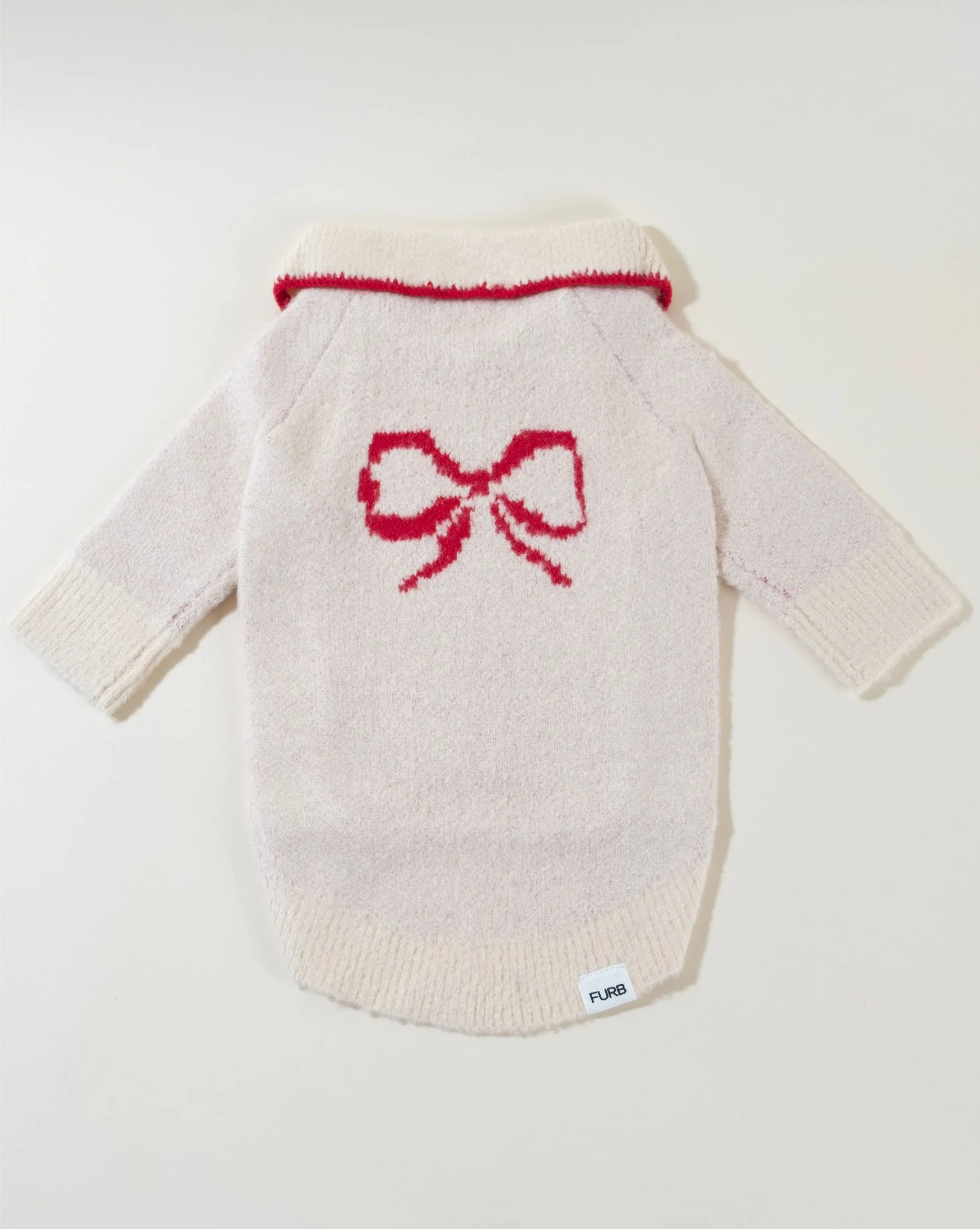 All Wrapped Up Ivory Bow Sweater